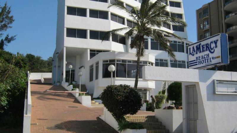 La Mercy Beach Hotel entrance and sign on South Beach Road